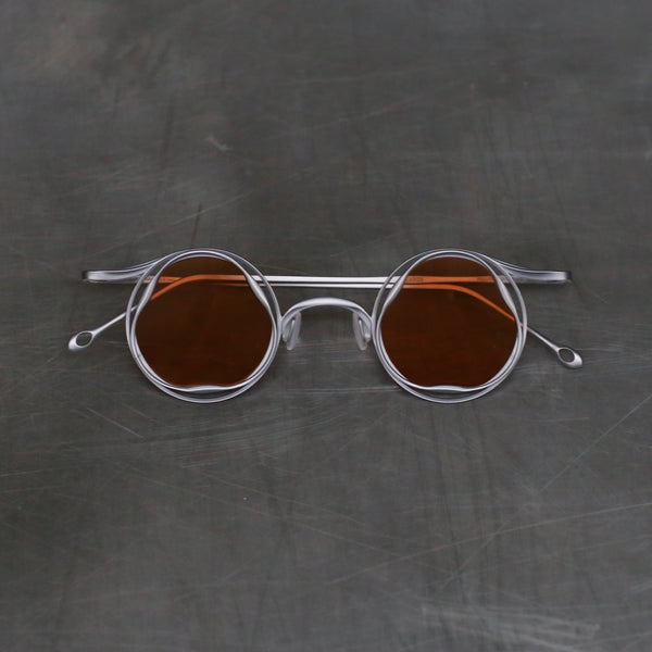 Rigards RG1078TI series titanium shaped frame sunglasses RG-RG1078TI-PGYKSWY polished x silver frame salmon color lenses
